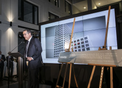 1 - John Psaila on stage with opening plaque (002)